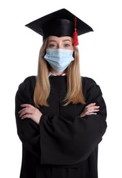 Photo of Student in protective mask with diploma on white background