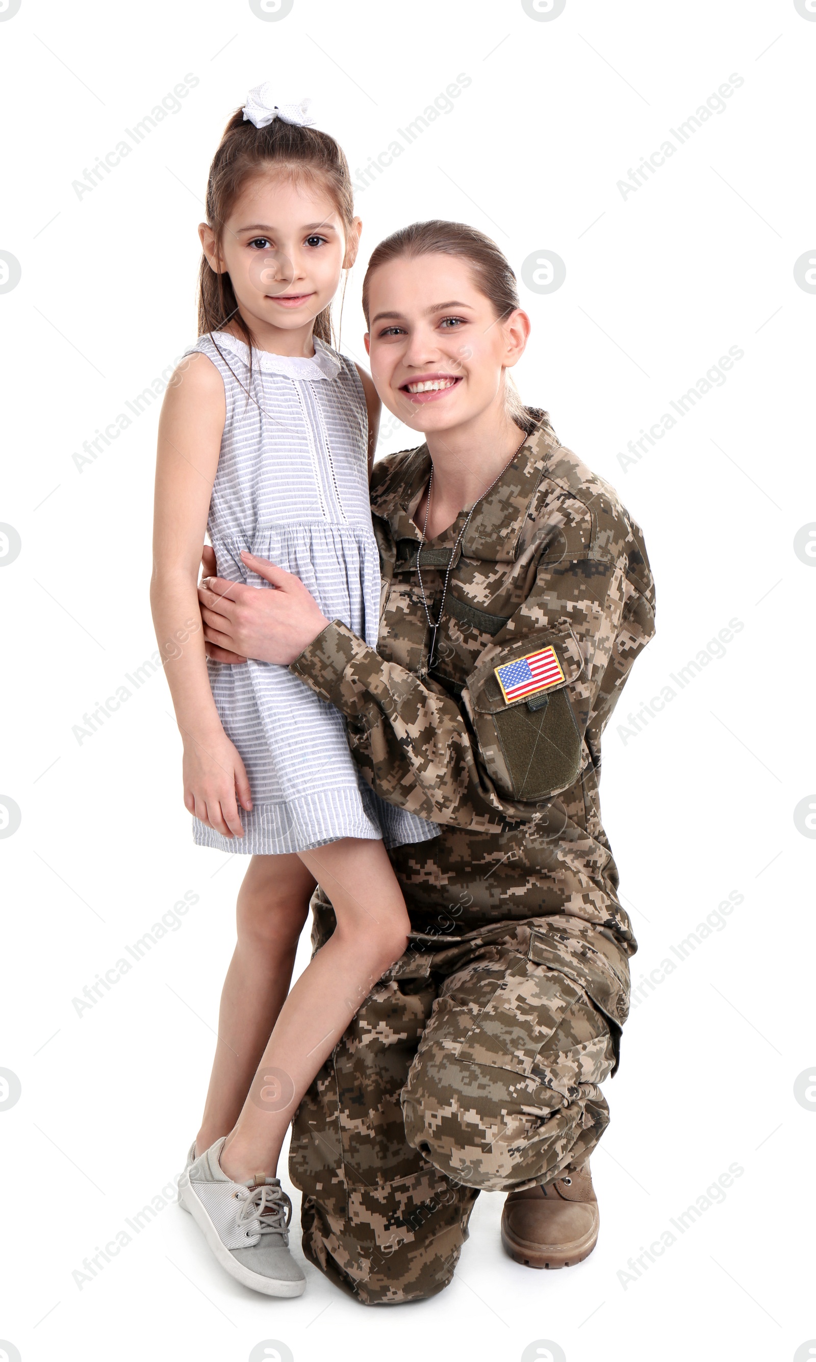 Photo of Female soldier with her daughter on white background. Military service