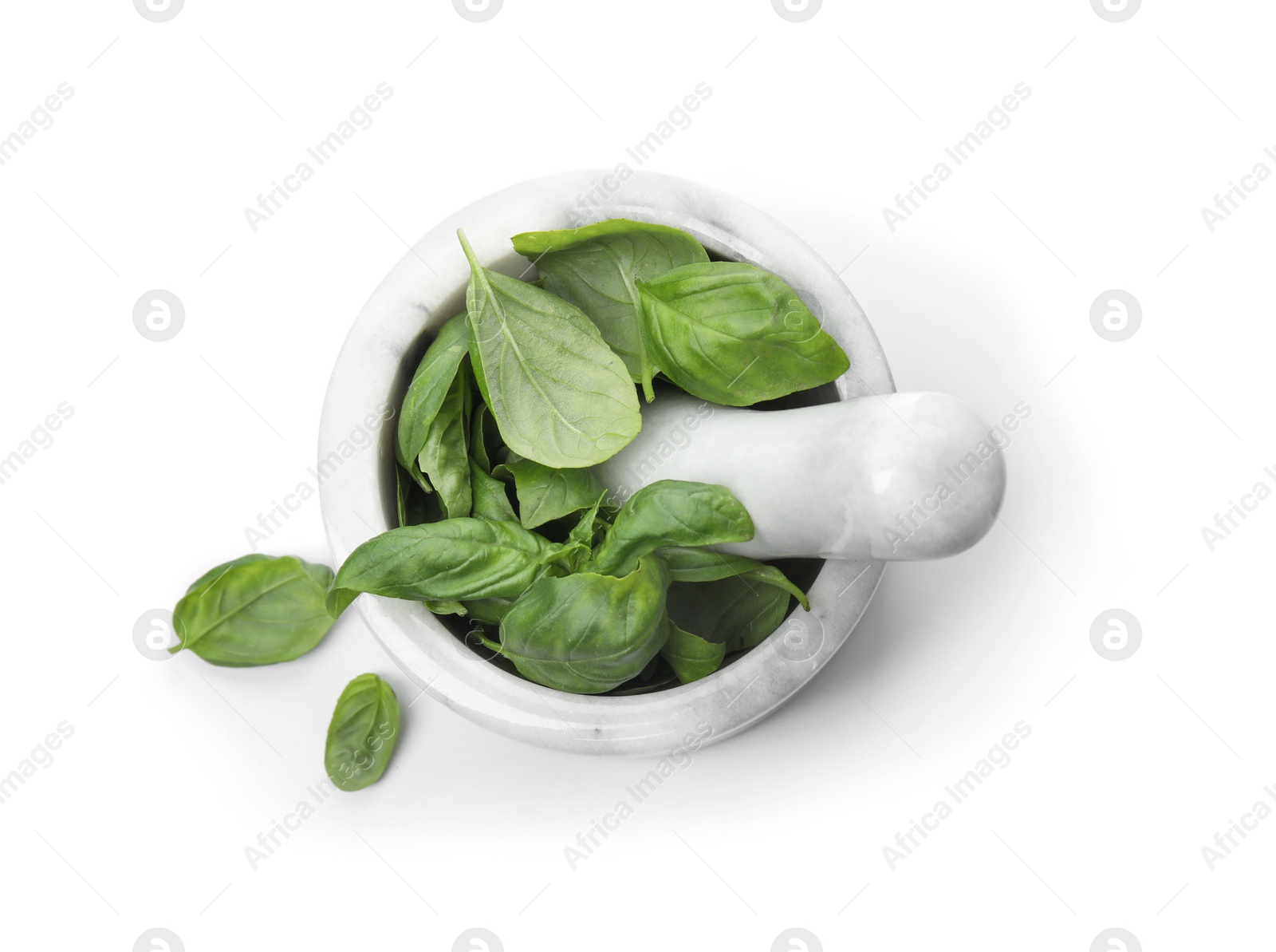 Photo of Mortar with fresh green basil leaves on white background, top view