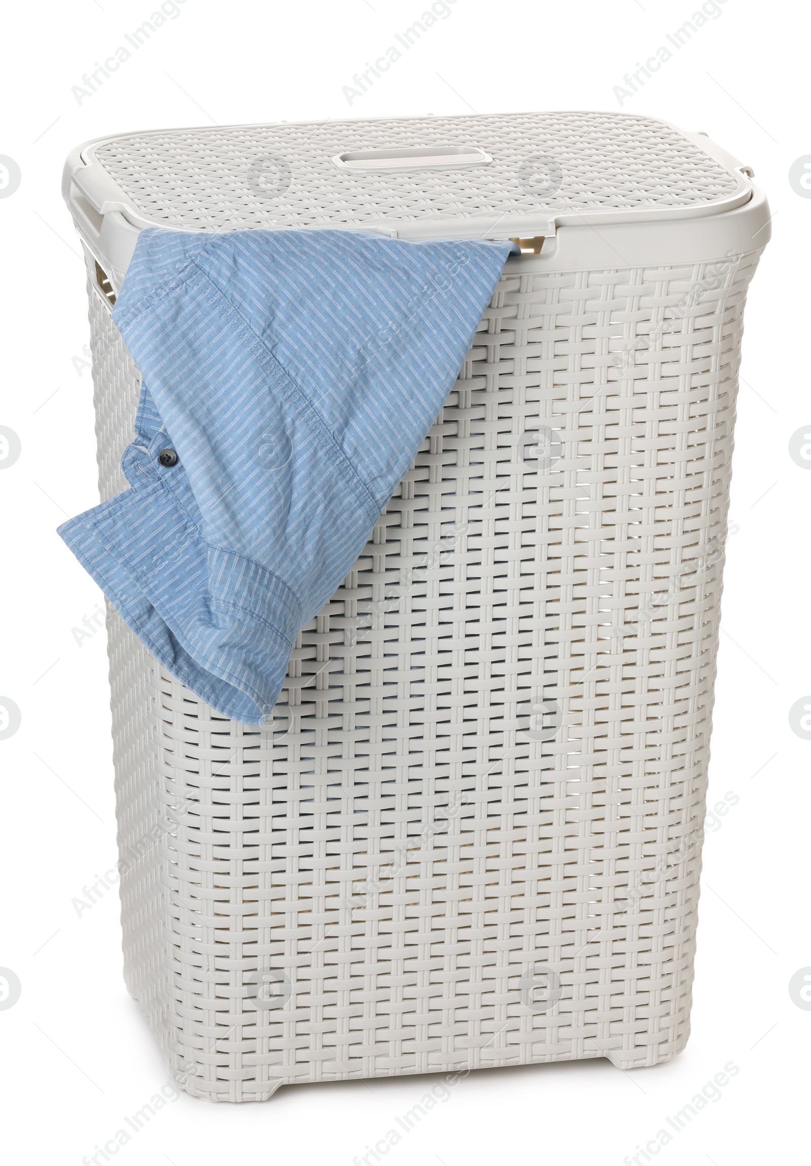 Photo of Plastic laundry basket with garment isolated on white
