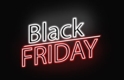 Text BLACK FRIDAY on dark background. Sale and special offer 