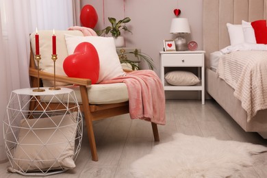 Photo of Cozy bedroom decorated for Valentine Day. Interior design