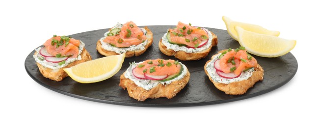 Photo of Tasty canapes with salmon, cucumber, radish and cream cheese isolated on white