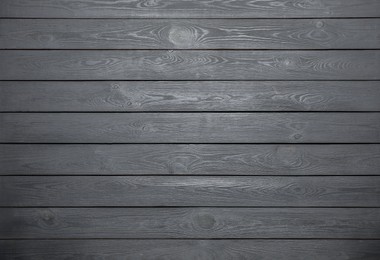 Photo of Texture of grey wooden surface as background, top view