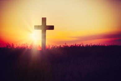 Image of Christian cross outdoors at sunset. Crucifixion Of Jesus