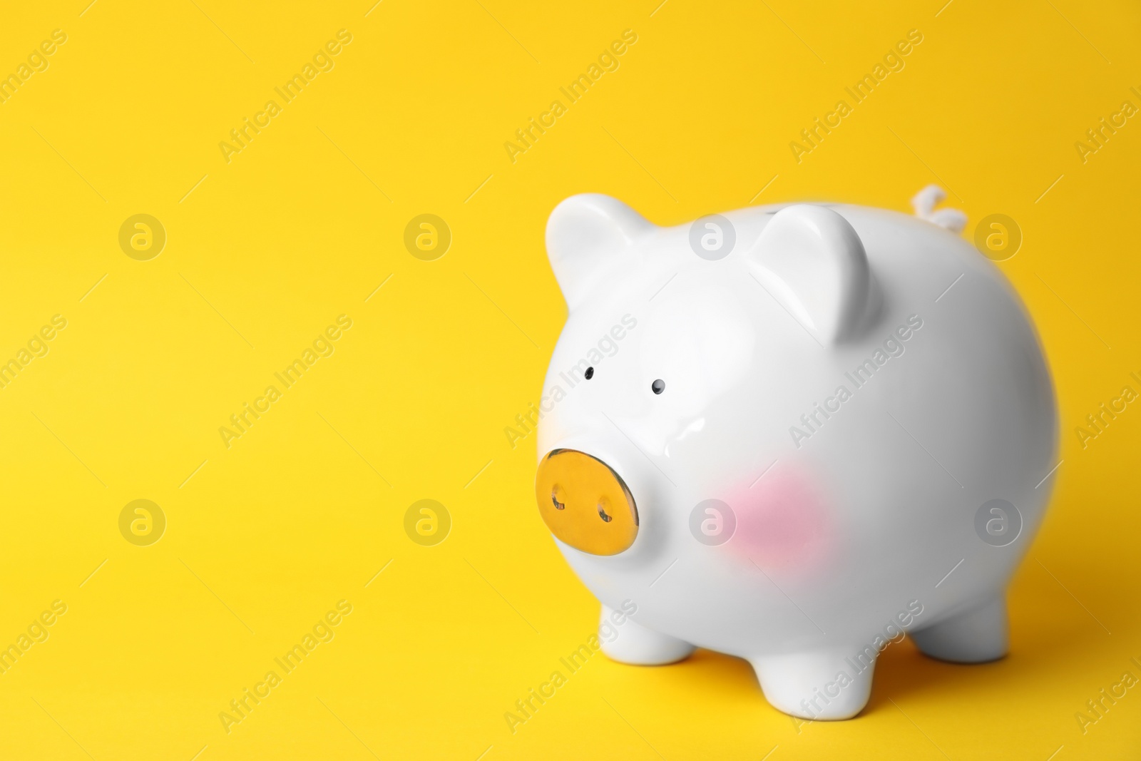 Photo of White piggy bank on color background. Money saving