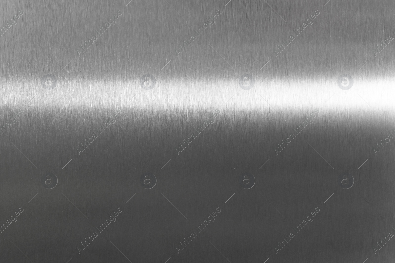 Photo of Shiny silver foil as background, top view