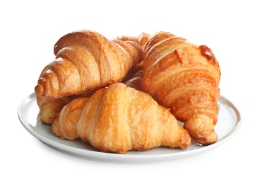 Photo of Plate with tasty croissants on white background. French pastry