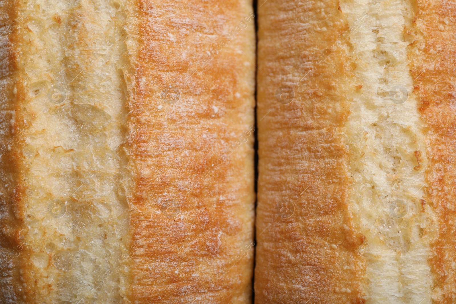 Photo of Tasty baguettes as background, top view. Fresh bread