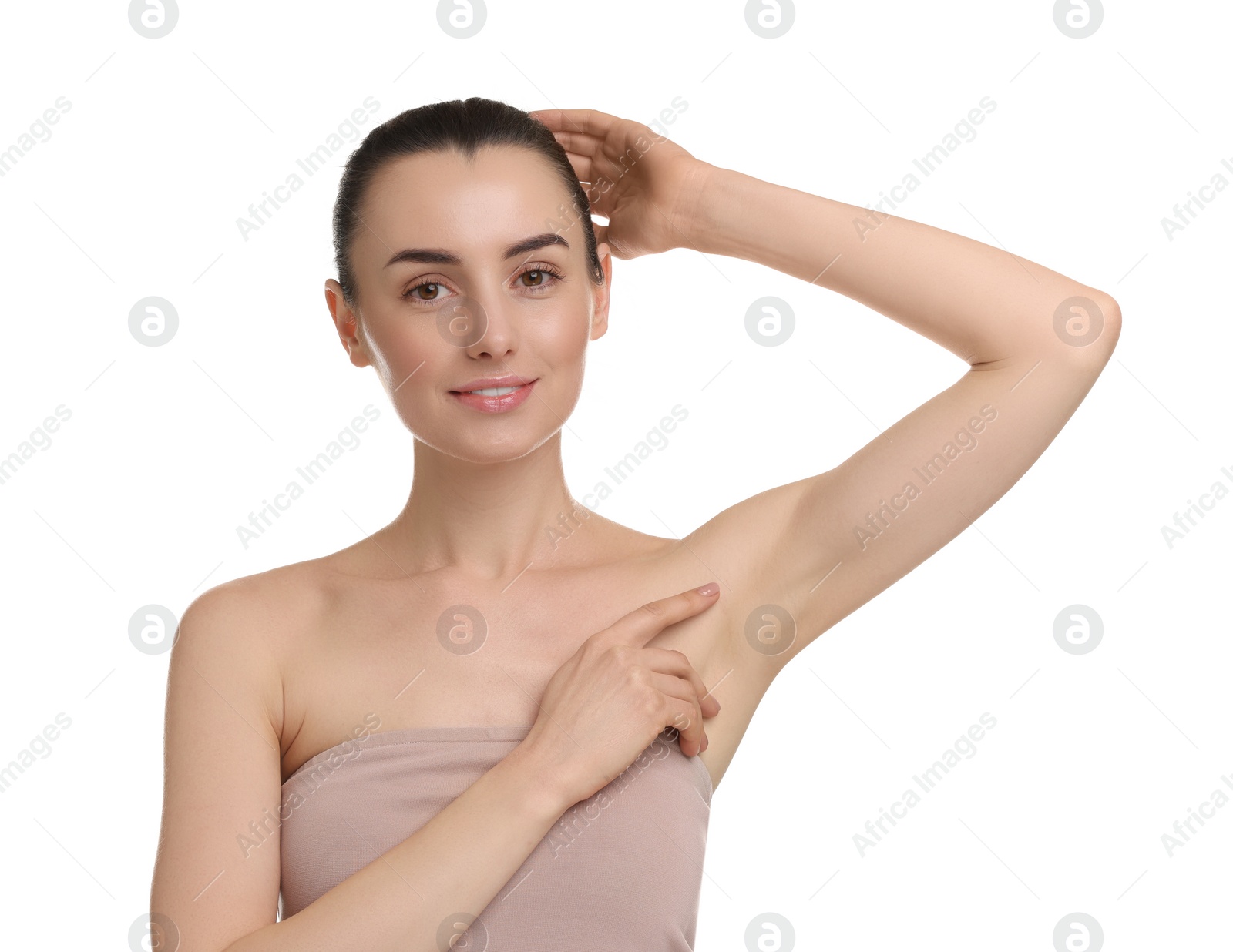 Photo of Beautiful woman showing armpit with smooth clean skin on white background