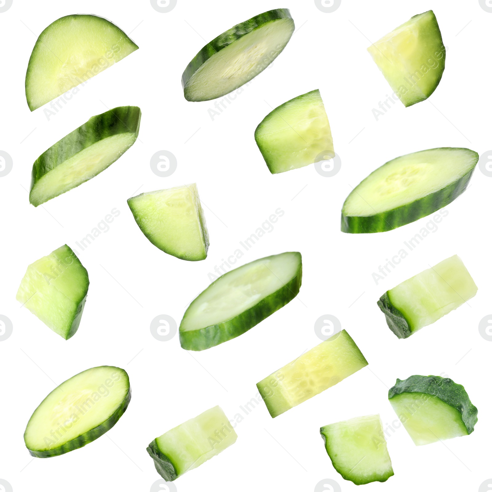 Image of Set of fresh cucumber slices on white background