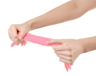 Photo of Woman holding pink felting wool on white background, closeup