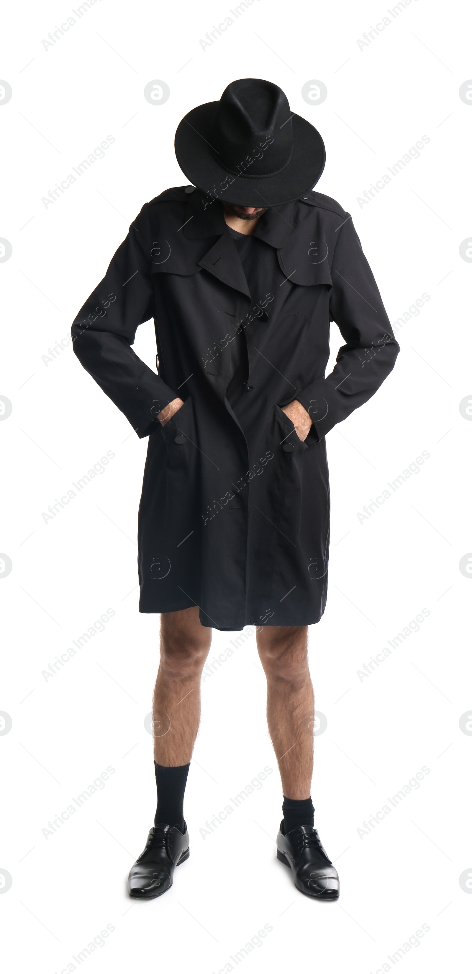 Photo of Exhibitionist in coat and hat isolated on white