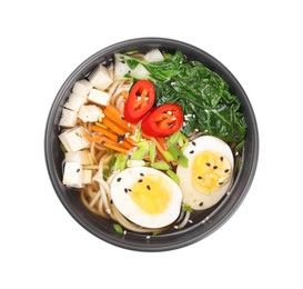 Photo of Delicious vegetarian ramen with egg, mushrooms, tofu and vegetables in bowl isolated on white, top view. Noodle soup