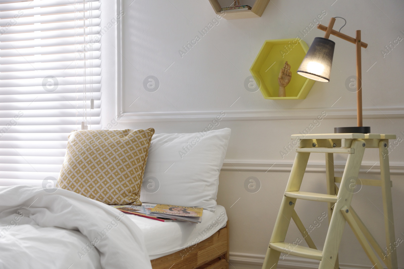 Photo of Comfortable bed with clean white linens indoors