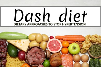 Dash diet (Dietary approaches to stop hypertension). Many different healthy food on white table, flat lay