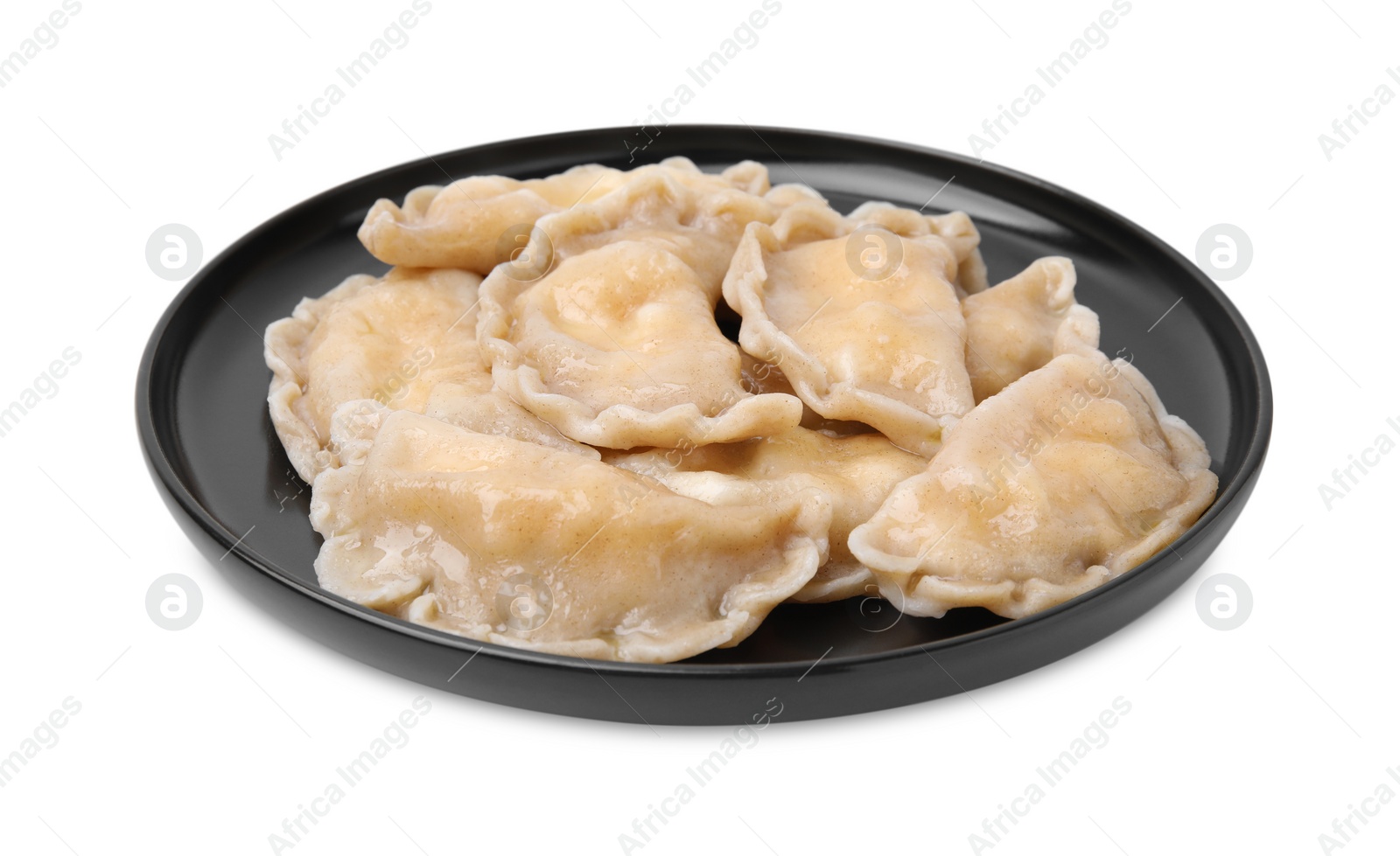 Photo of Plate of delicious dumplings (varenyky) with cottage cheese isolated on white