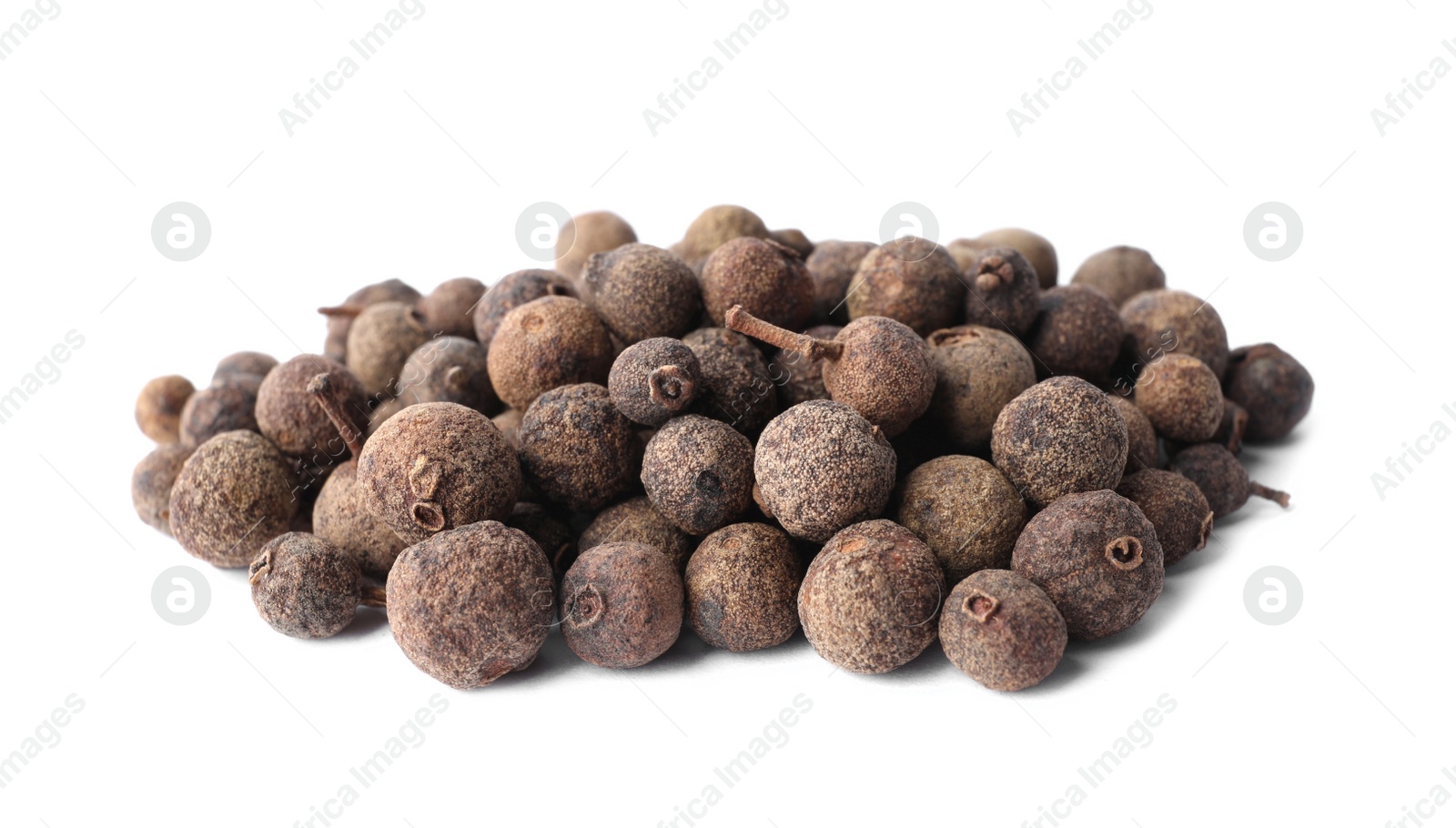 Photo of Heap of black pepper grains isolated on white