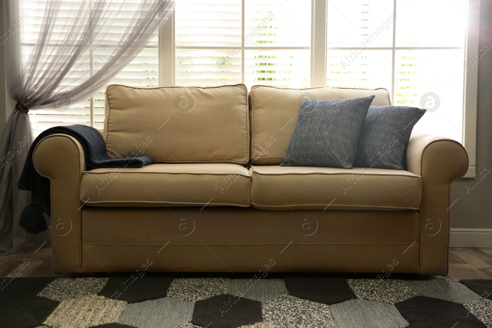 Photo of Modern living room interior with stylish comfortable sofa