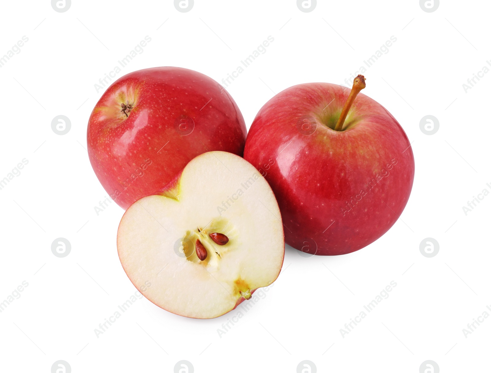Photo of Whole and cut red apples isolated on white