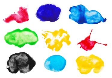 Image of Set with colorful blots of ink on white background, top view