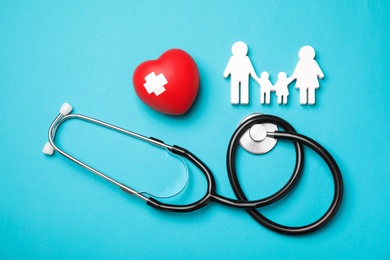 Photo of Flat lay composition with red heart and stethoscope on color background. Cardiology concept