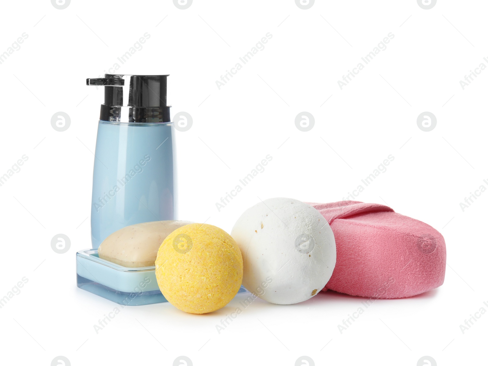 Photo of Bath bombs and toiletries on white background