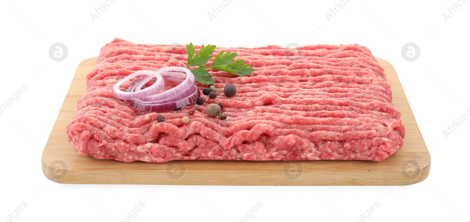 Photo of Board with raw ground meat, onion, peppercorns and parsley isolated on white