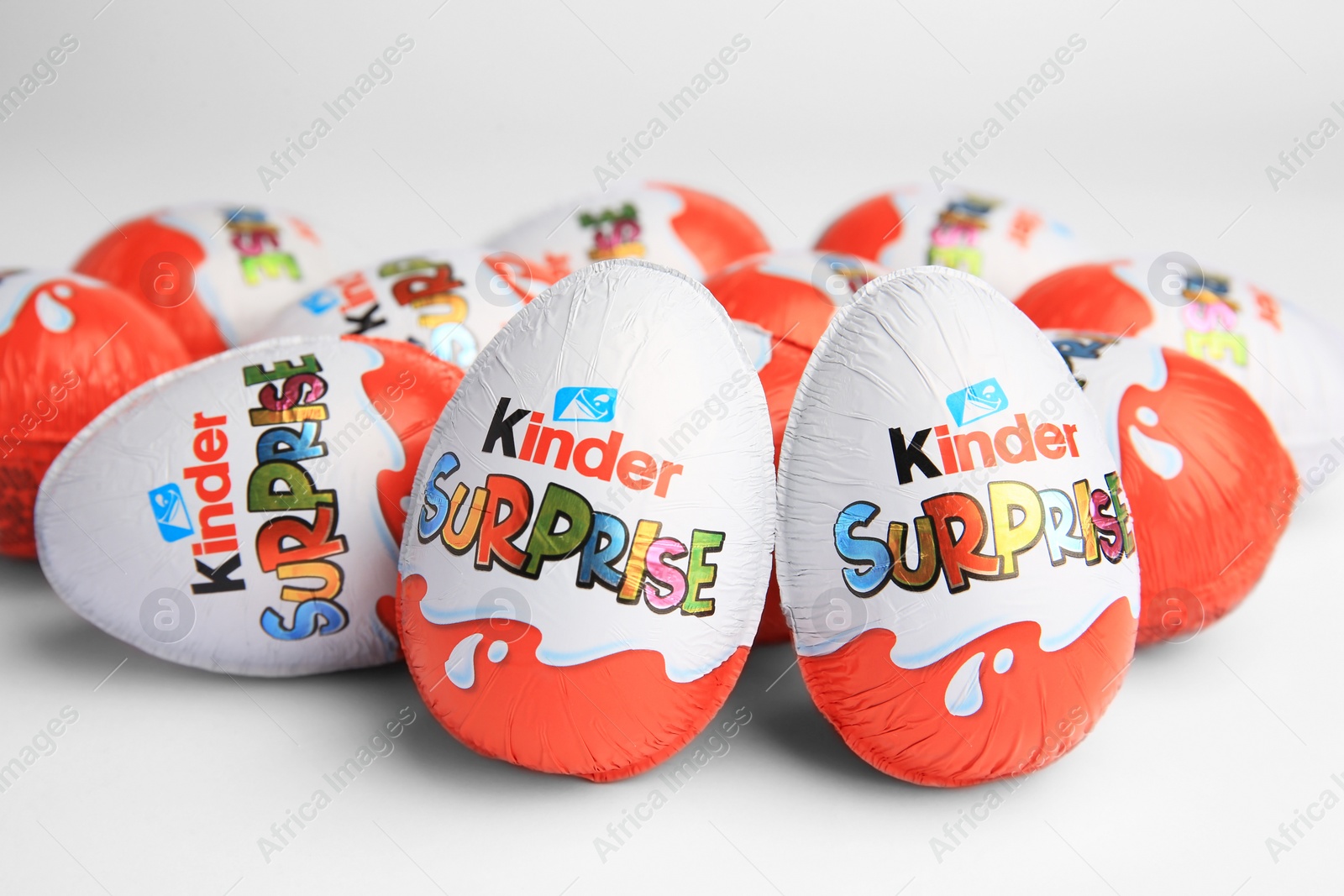 Photo of Sveti Vlas, Bulgaria - June 26, 2023: Kinder Surprise Eggs on white background, closeup