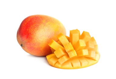 Photo of Delicious whole and cut mangoes on white background