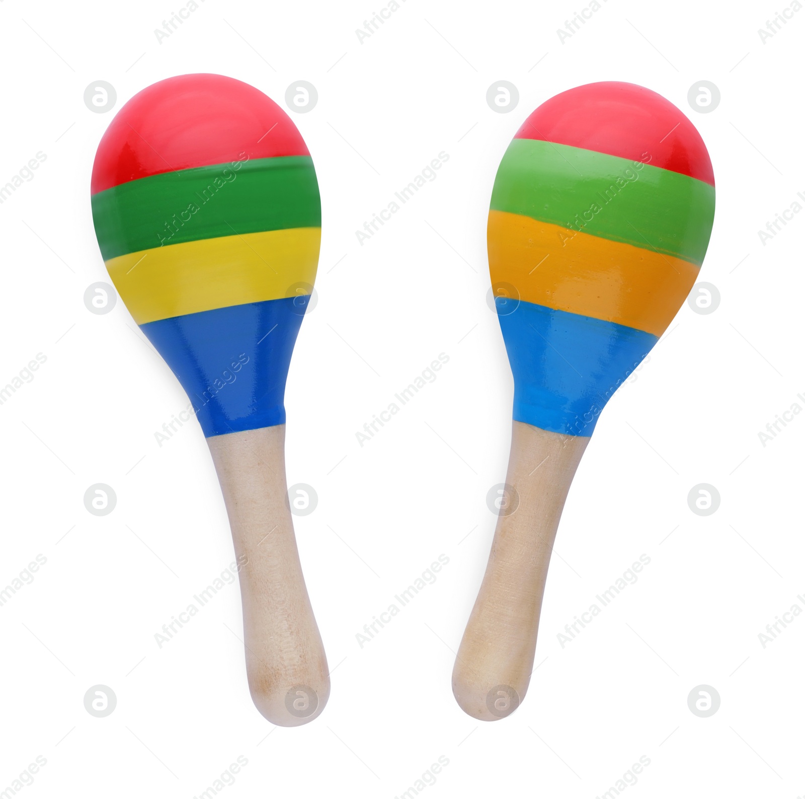 Photo of Colorful maracas on white background, top view. Musical instrument