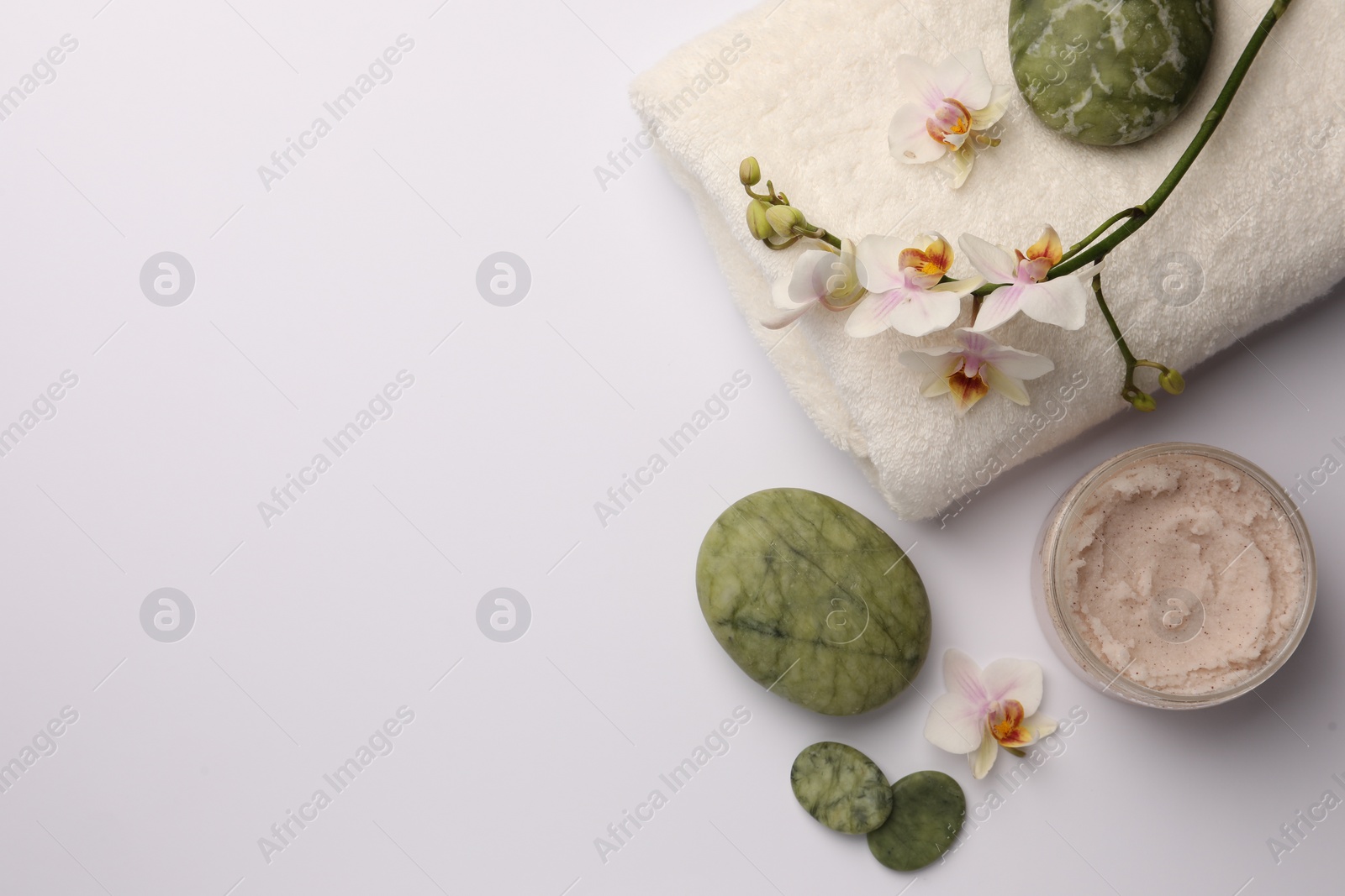 Photo of Flat lay composition with different spa products on white background. Space for text