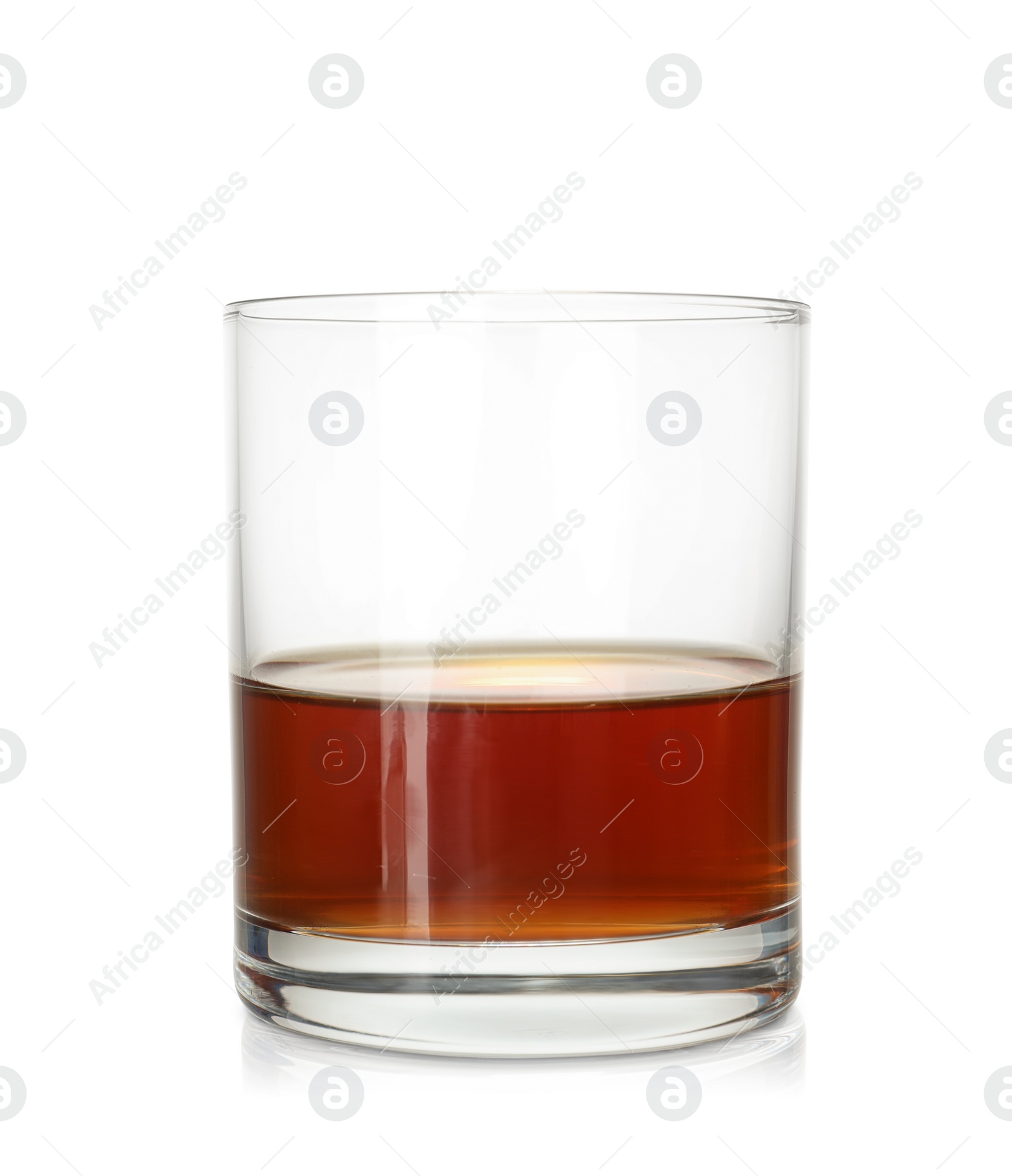 Photo of Glass of scotch whiskey on white background