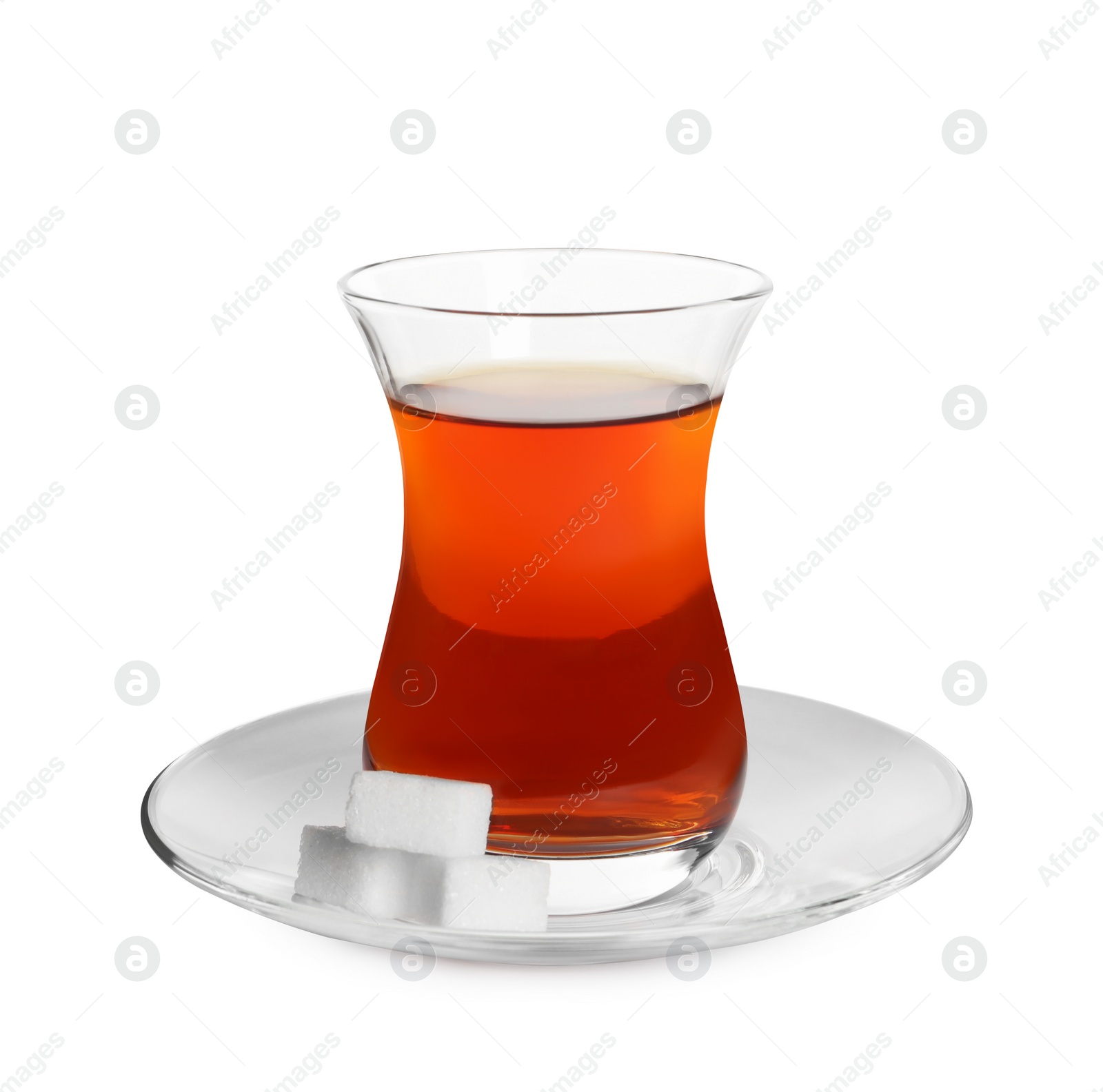 Photo of Glass of traditional Turkish tea with sugar cubes isolated on white