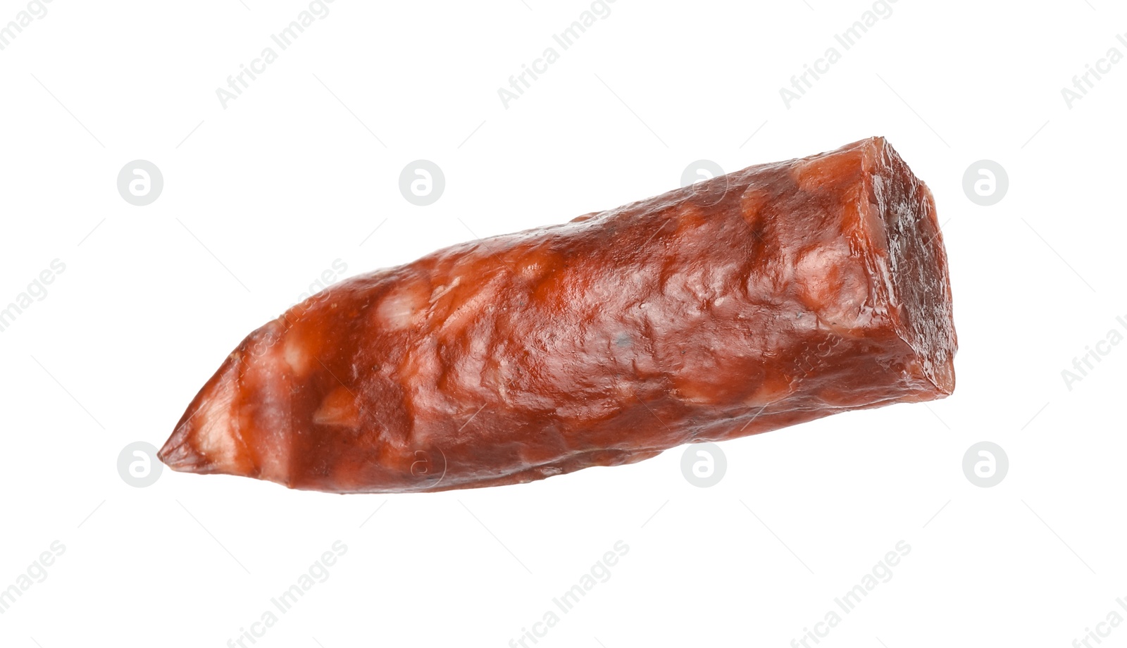 Photo of Piece of thin dry smoked sausage isolated on white