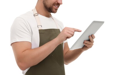 Smiling man using tablet on white background, closeup