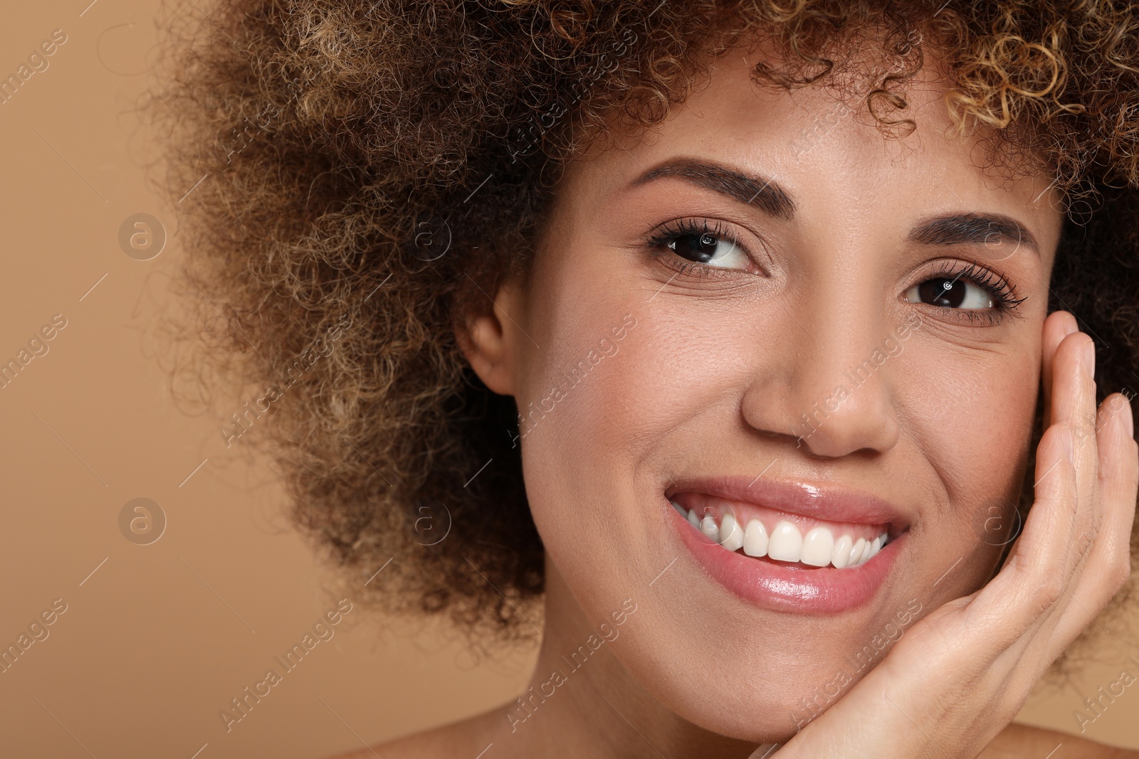 Photo of Beautiful woman with healthy skin on beige background, closeup