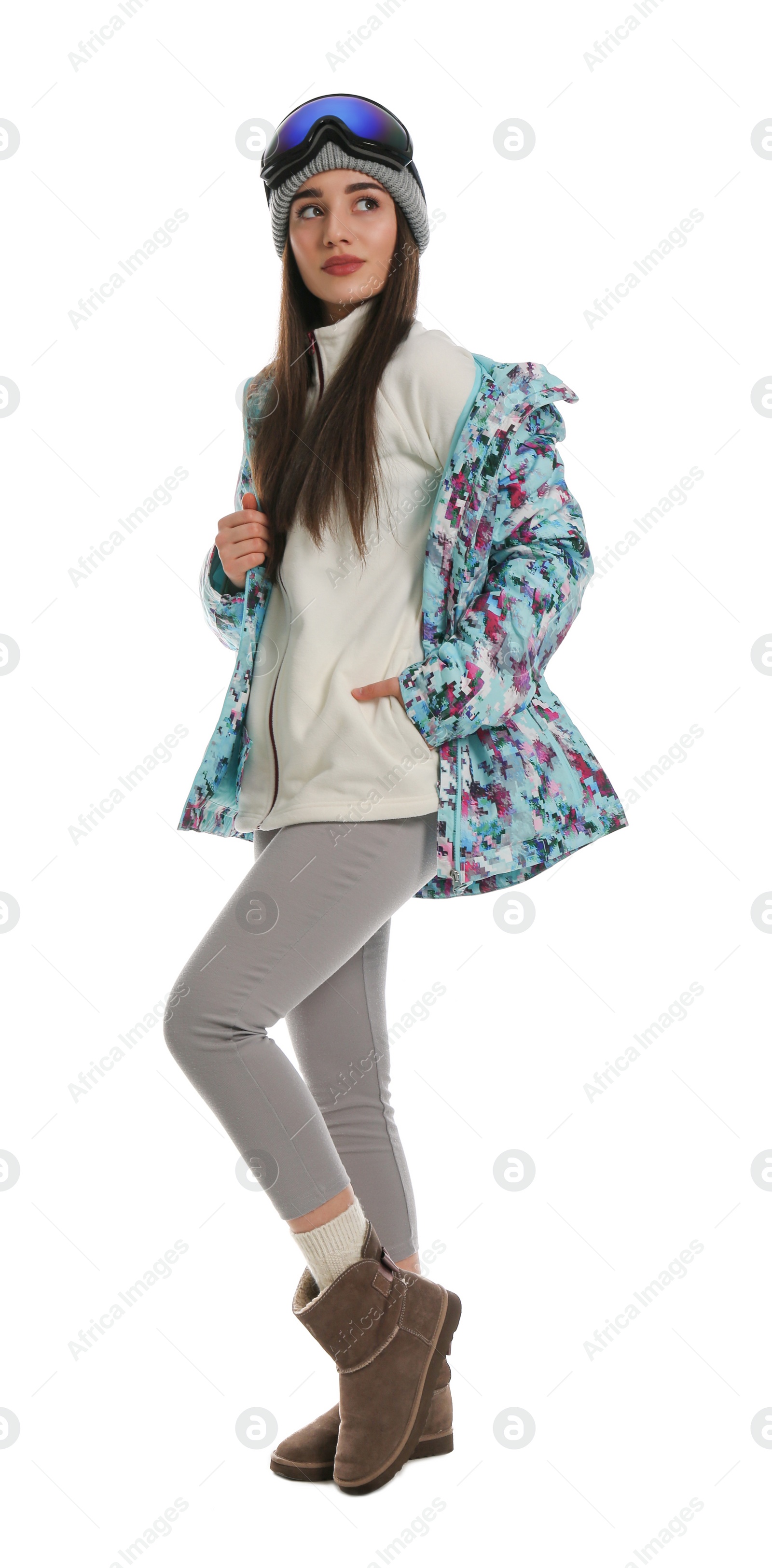 Photo of Woman wearing stylish winter sport clothes on white background