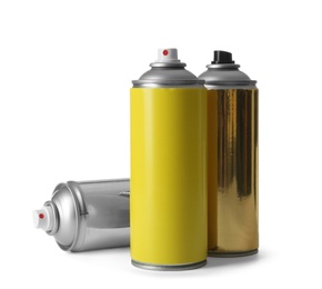 Cans of different spray paints on white background