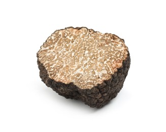 Photo of Cut fresh black truffle isolated on white