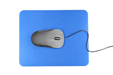 Blank pad and computer mouse on white background, top view