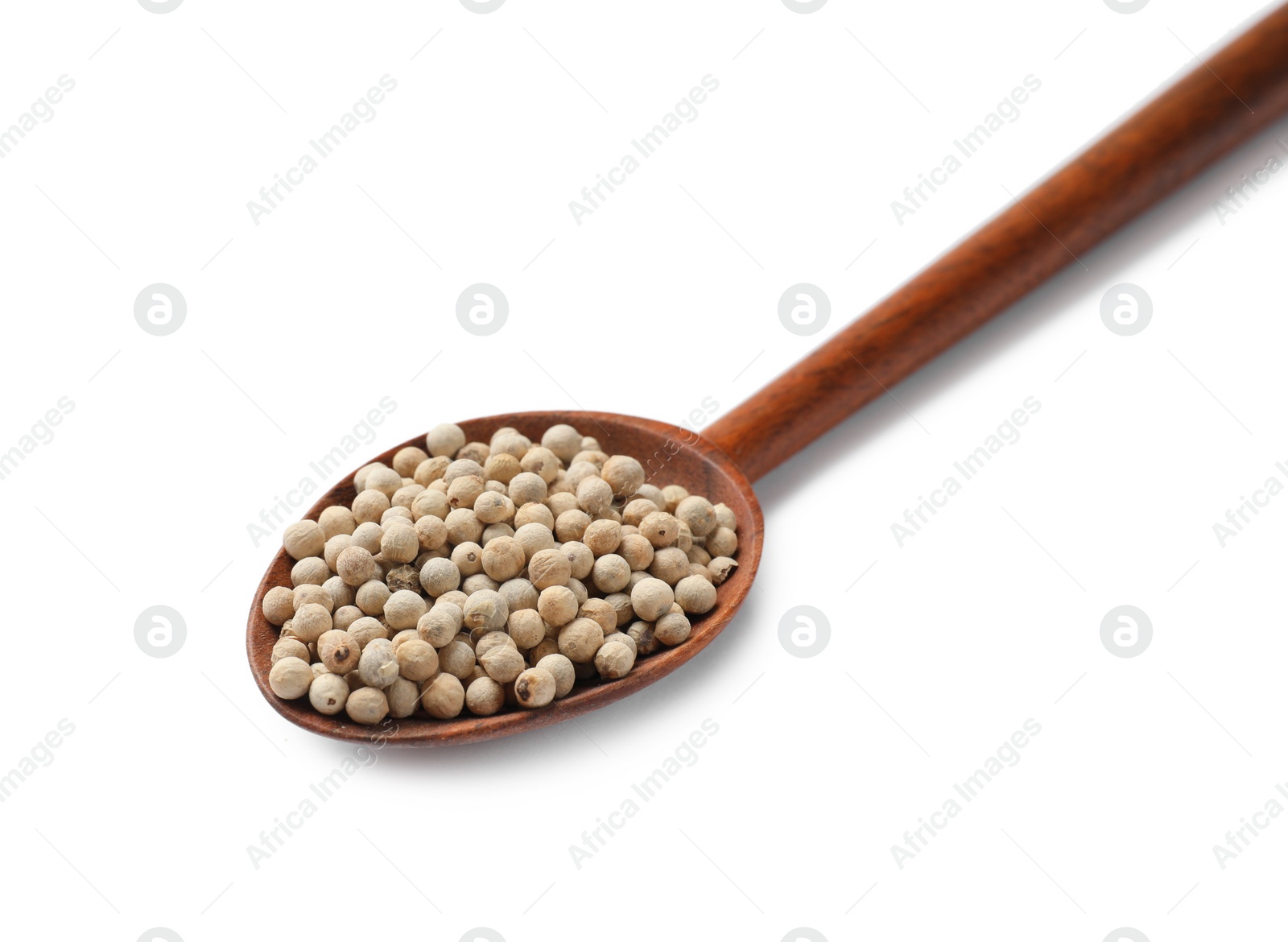 Photo of Aromatic spice. Many peppercorns in spoon isolated on white