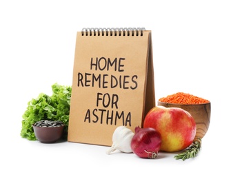 Natural products and notebook with text HOME REMEDIES FOR ASTHMA on white background