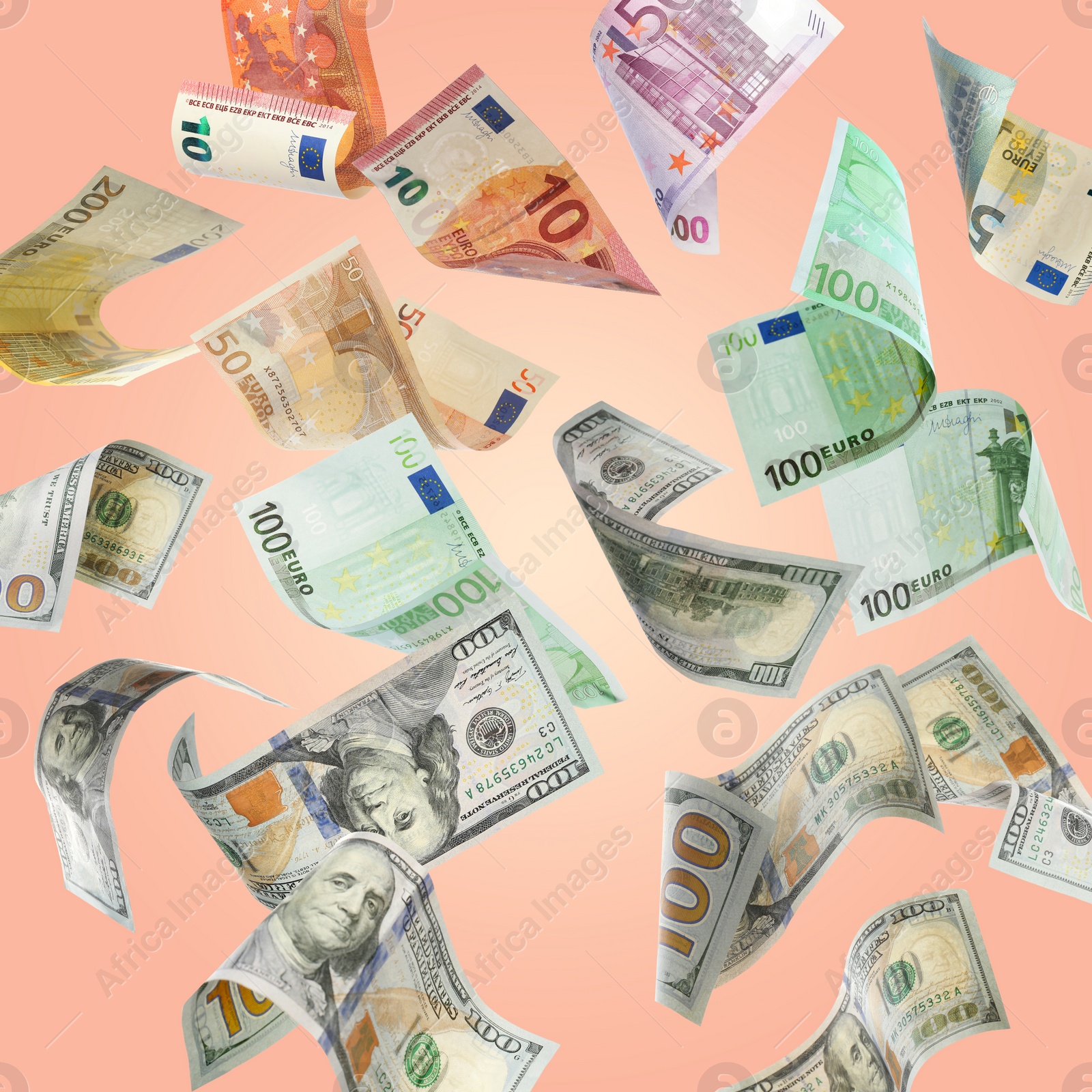 Image of Money exchange. Many dollars and euro banknotes falling on pale coral background