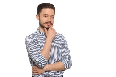 Photo of Handsome man in striped shirt touching face on white background