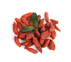 Photo of Pile of dried goji berries and leaves on white background, top view