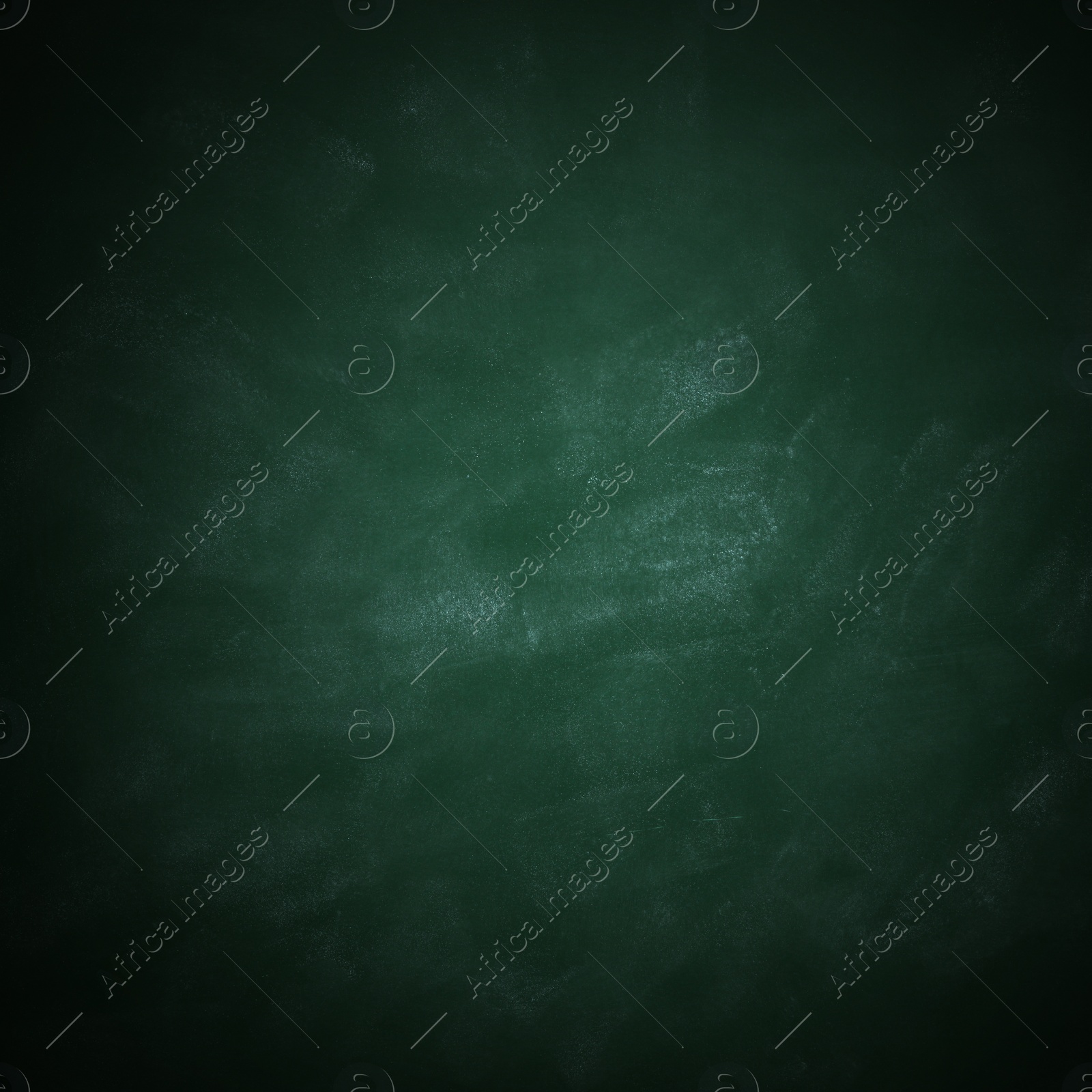 Image of Dirty green chalkboard as background. Vignette effect