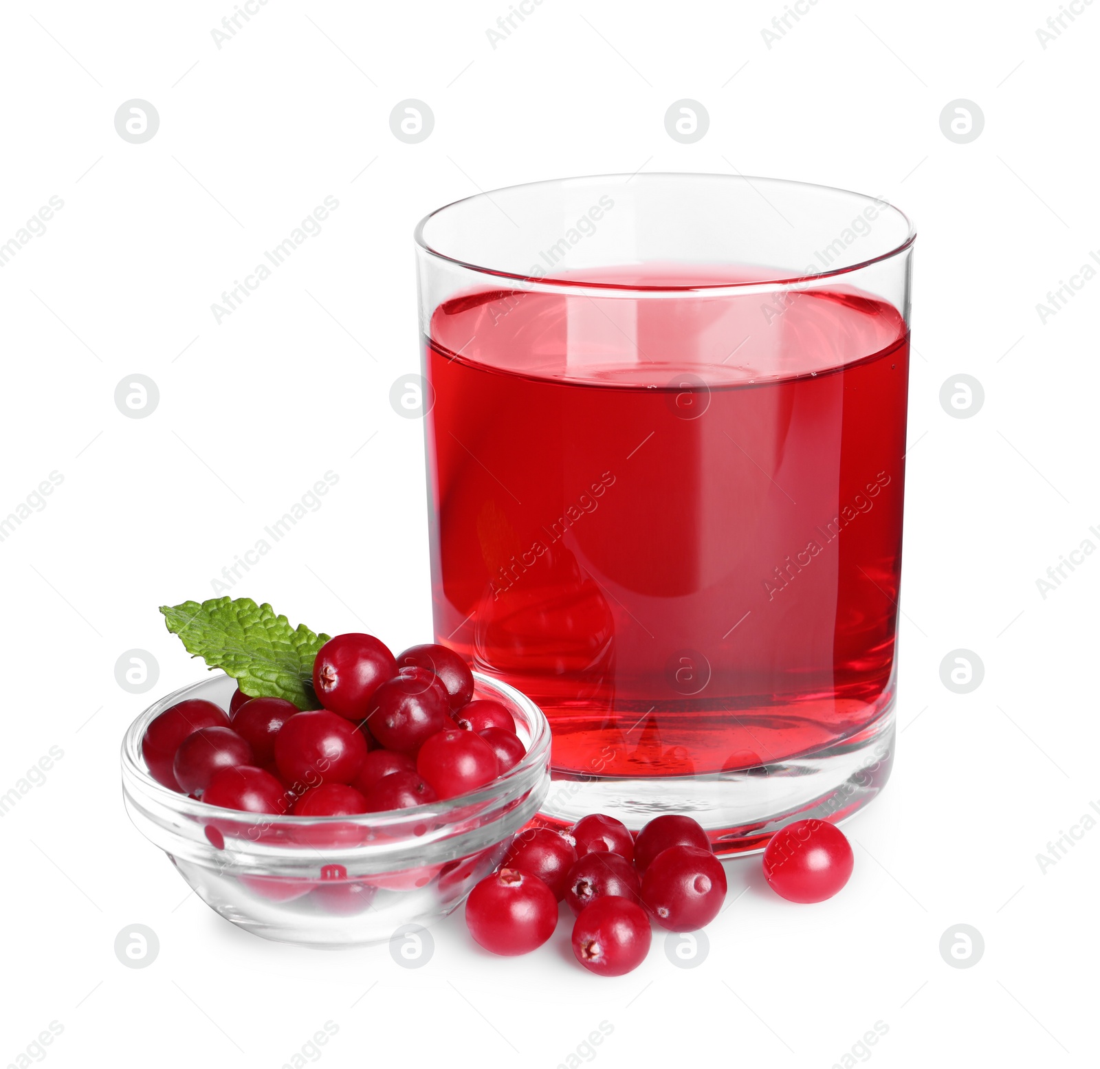 Photo of Tasty refreshing cranberry juice, mint and fresh berries isolated on white