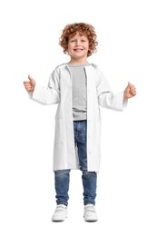 Little boy in medical uniform showing thumbs up on white background