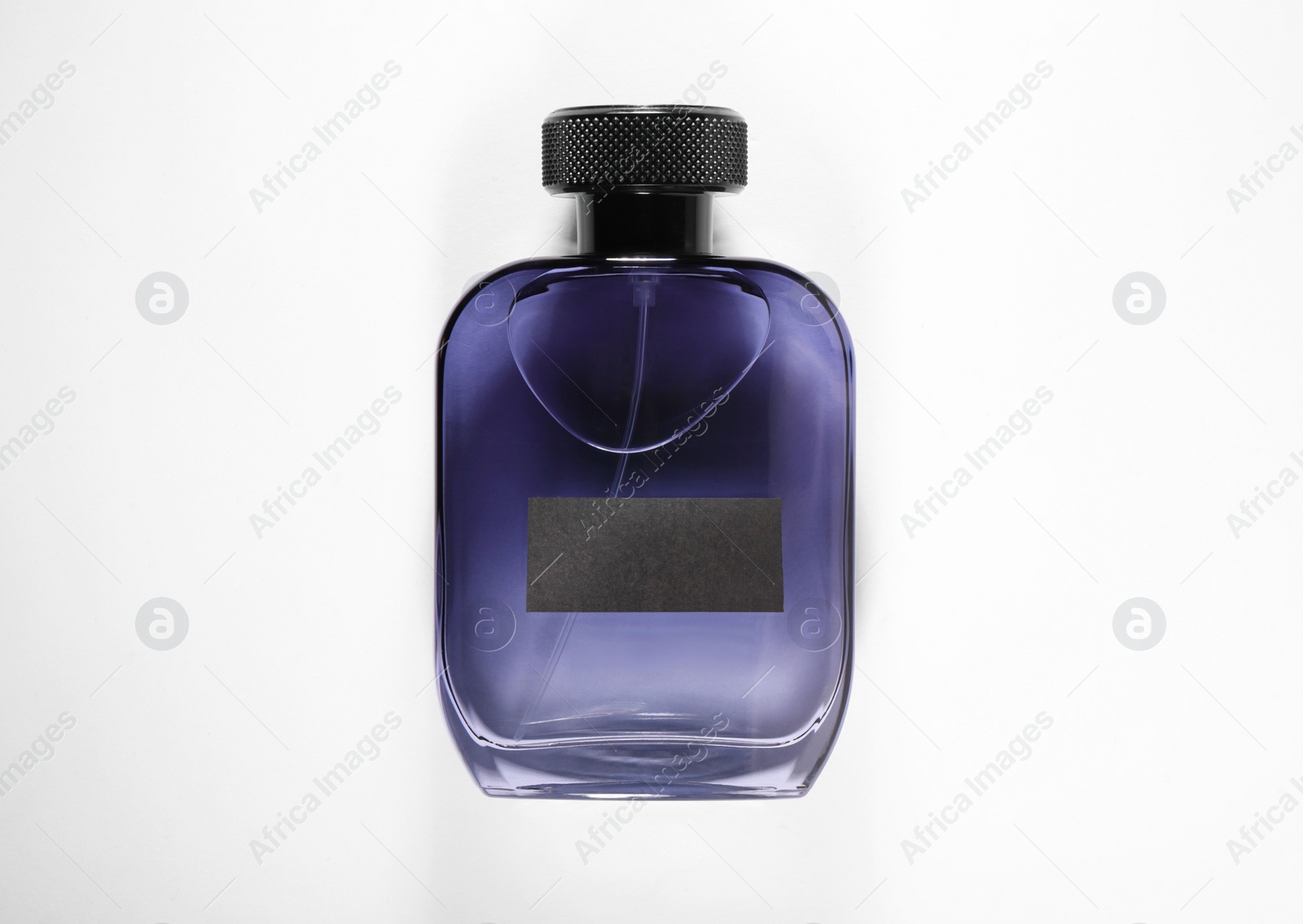 Photo of Luxury men`s perfume in bottle on white background, top view